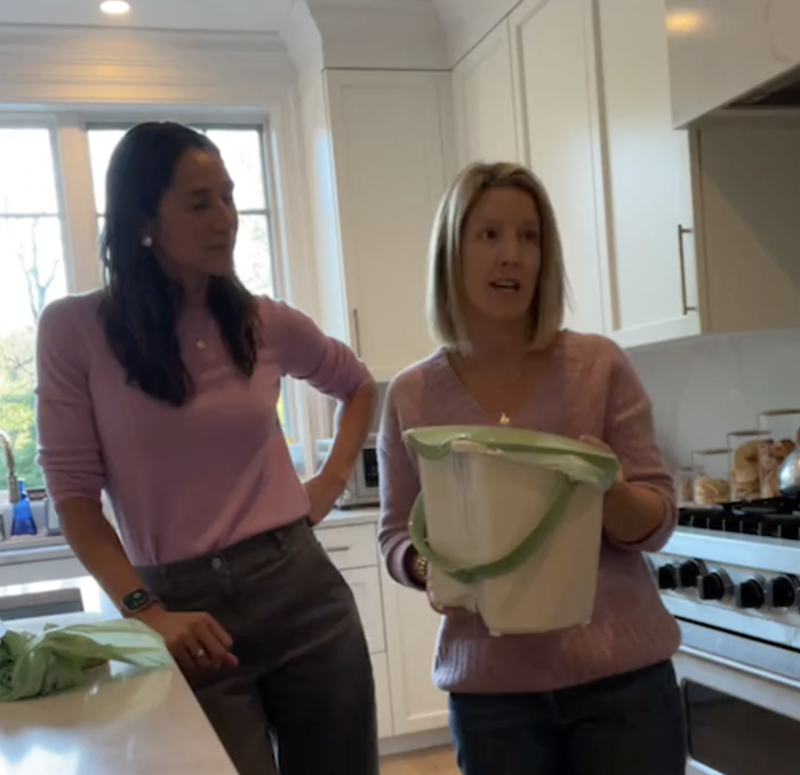 Jo and Gately demonstrating composting